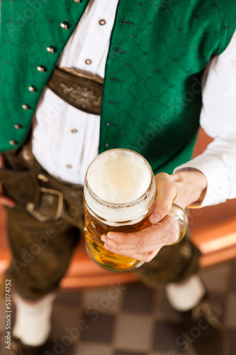 Photo: Man with beer glass in brewery Man with beer glass in brewery