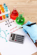 Hand scientist writing formulas