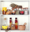 Variety spices on kitchen shelves