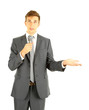 Young businessman talking with microphone, isolated on white