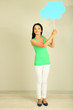 Photo: Thought girl in bubble next to it on grey background Thought girl in bubble next to it on grey background