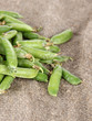 Green peas on bagging background