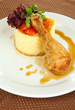 Small portion of food on big plate close up