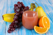 Glass of fresh juice on table close-up