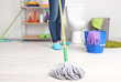 Cleaning floor in room close-up