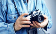 Image of reporter with film camera