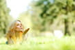 Foto: Woman lying on grass Woman lying on grass