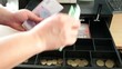 Cash register drawer with Ukrainian money