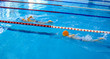 Two little boys swim