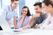 Business people using laptop