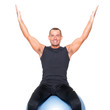 Man on gymnastic ball