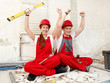 Worker rest on a rubble mountain cheering together  in site