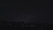 Lightning strikes buildings in city sky. Thunder sound roars