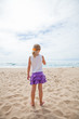 Young girl standing at beach