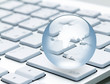 Globe on a keyboard laptop