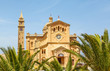 palm leaves and Ta 'Pinu Church