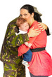 Soldier man embracing his family