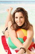 lachende Frau am Strand