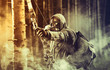 A male bow hunter wearing gas mask