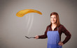 Woman making pancakes