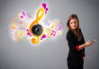 pretty girl singing and listening to music with musical notes