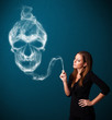 Young woman smoking dangerous cigarette with toxic skull smoke