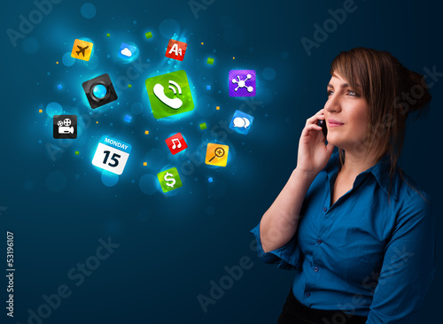 Photo: Young woman calling by phone with various icons Young woman calling by phone with various icons