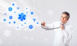 Doctor with blue medical icons