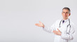 Doctor listening to empty copy space with stethoscope