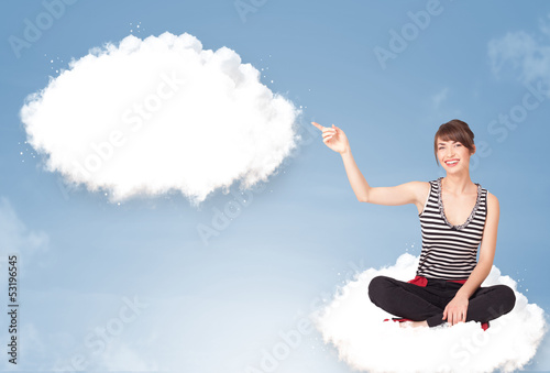 Photo: Young girl sitting on cloud and thinking of abstract speech bubb Young girl sitting on cloud and thinking of abstract speech bubb