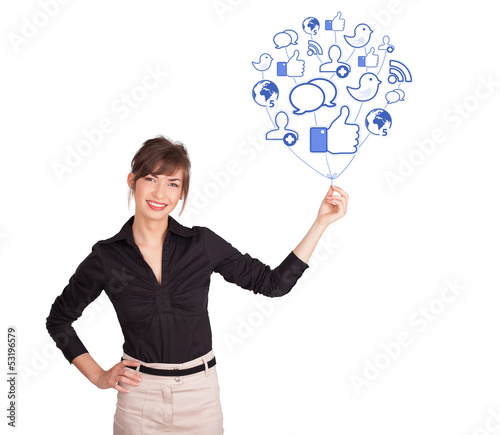 Photo: Happy lady holding social icon balloon Happy lady holding social icon balloon