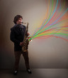 Attractive musician playing on saxophone while colorful abstract