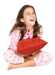 Hispanic teenager wearing pajamas and laughing