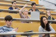 Foto: Students having a lesson in the lecture hall Students having a lesson in the lecture hall