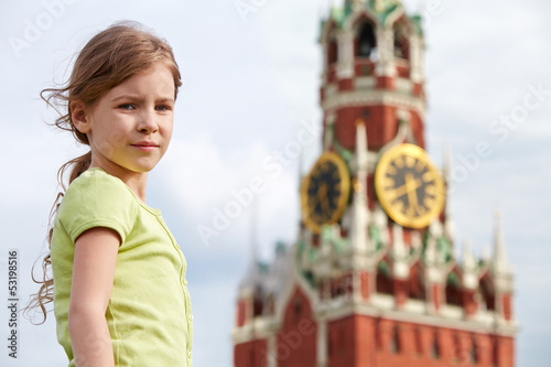 Photo: Portrait of girl against Spassky tower of Moscow Kremlin Portrait of girl against Spassky tower of Moscow Kremlin
