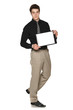 Young serious businessman showing blank clipboard