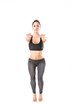 woman making a Yoga pose: Awkward Pose - Utkatasana