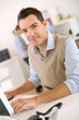 Man Working In Office In Front...