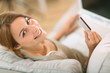Upper view of woman in sofa shopping on internet