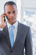 Serious businessman on a call