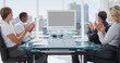 Business people applauding during a video conference
