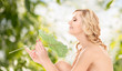 Photo: woman with green leaf woman with green leaf