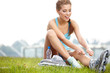 young woman skating with rollerblades in a park
