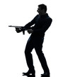 Photo: gangster man holding thompson machine gun silhouette gangster man holding thompson machine gun silhouette