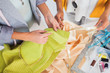 Women touching textile