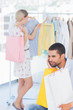 Photo: Desperate man being bored while his wife is shopping Desperate man being bored while his wife is shopping