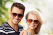 Photo: happy young couple in the woods happy young couple in the woods