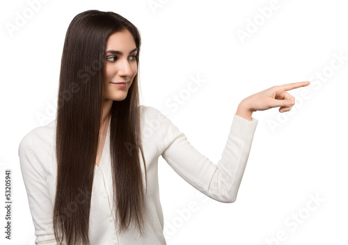 Photo: Portrait of attractive businesswoman pointing her finger Portrait of attractive businesswoman pointing her finger