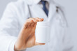 doctor hands holding white pack