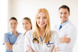 female doctor in front of medical group